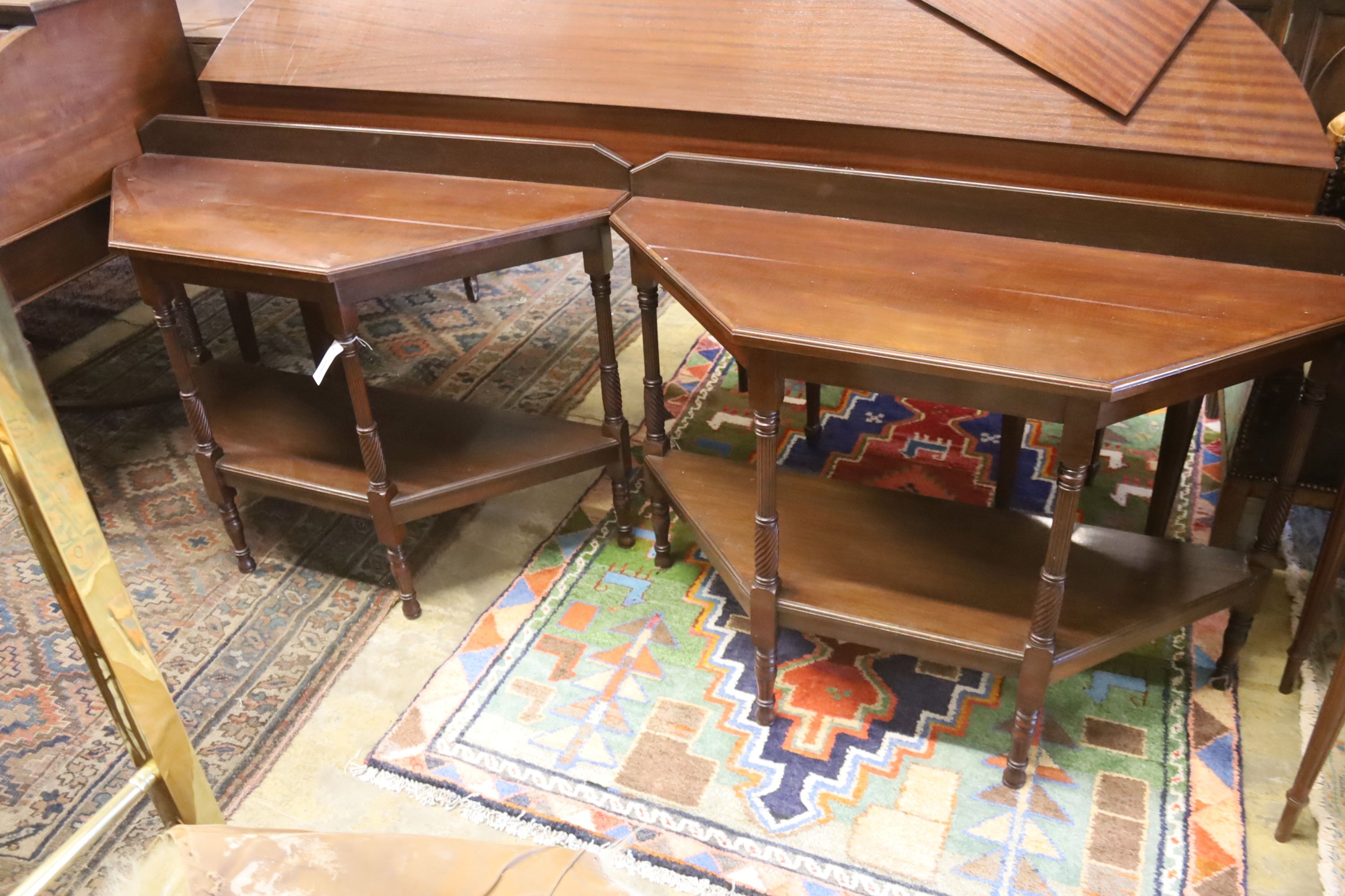 A pair of late Victorian style mahogany two tier side tables, (altered) width 106cm, depth 40cm, height 78cm